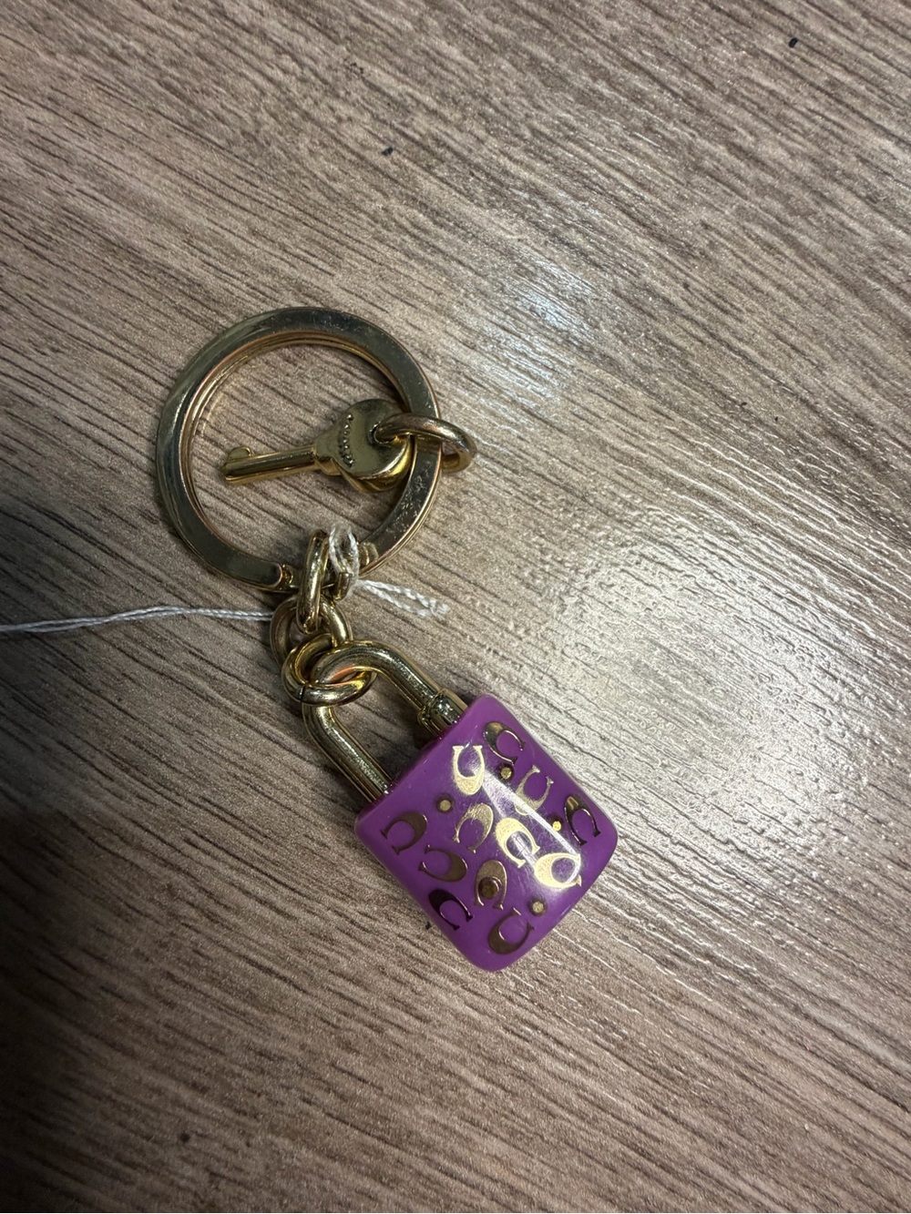 Coach Gold-Tone Keyring with Purple Enamel Padlock Charm and Mini Key - Picture 4 of 5